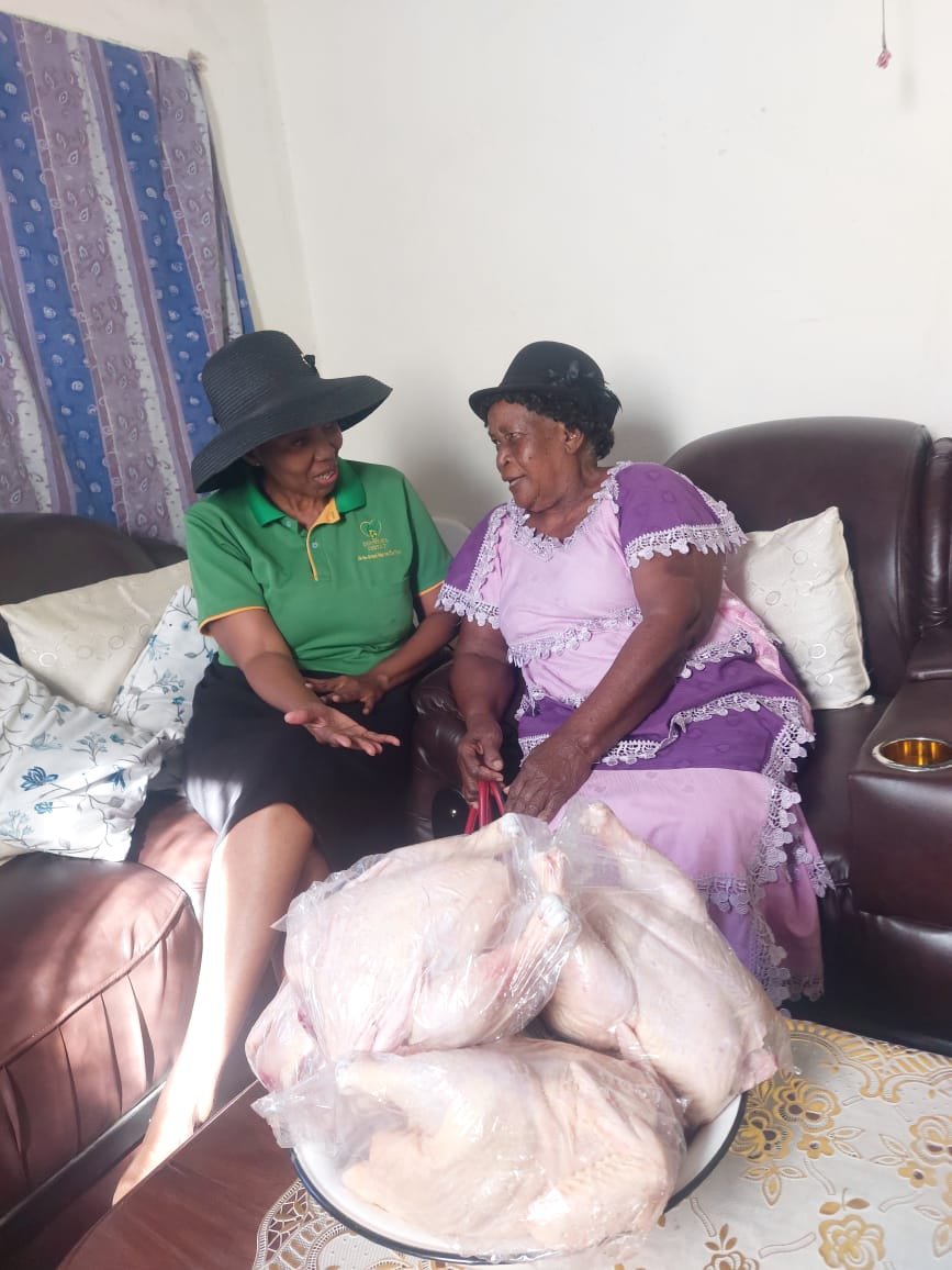 Agent delivering food parcels to an elderly relative